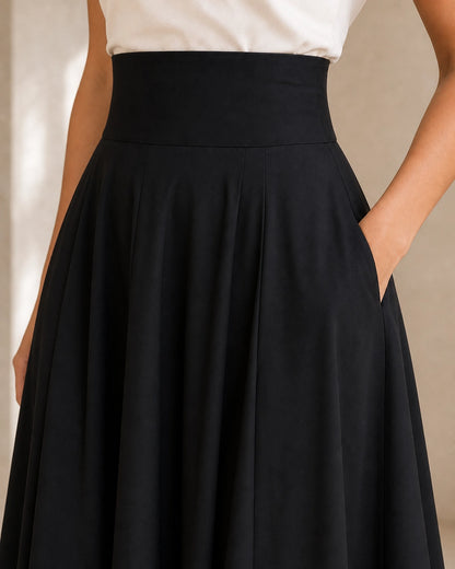Women's High-Waist Bow Midi Skirt with Pockets — image 5 — gonna-midi-elegante-ideale-per-autunno-e-primavera-black-05-construction-detail.webp