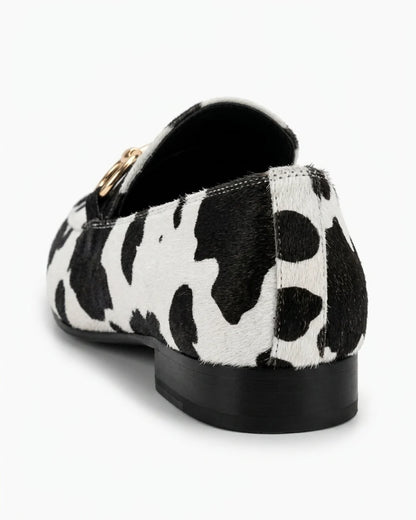 Octavia | Western Cow Print Buckle Flat Loafers — loafers-for-women-animal-print-slip-on-black-white-06-reference-view.webp