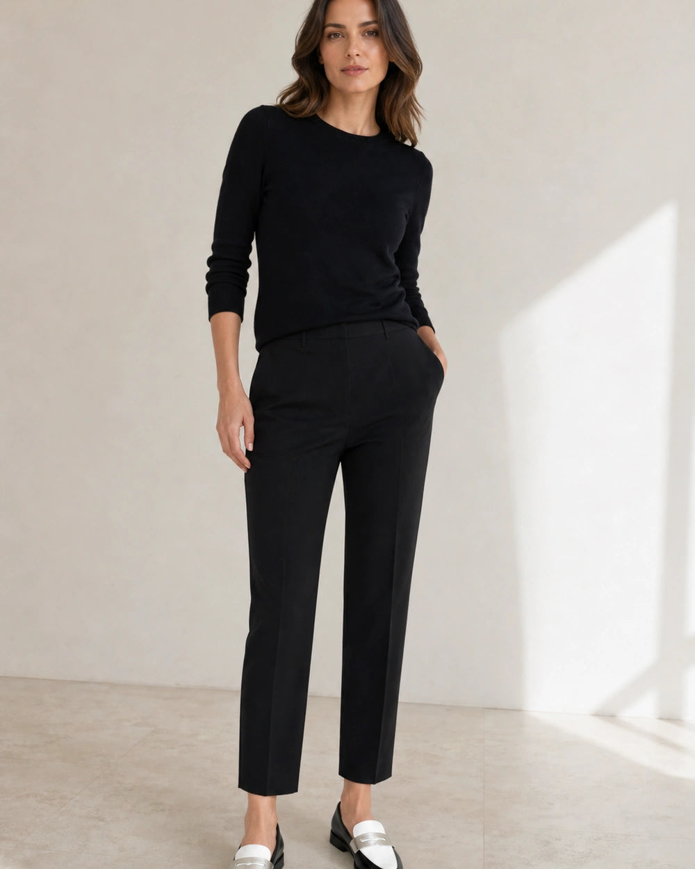 Women's Black and White Loafers with Silver Strap — worn by a model