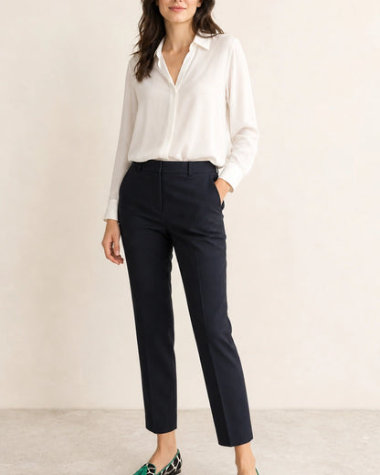 Women's Pointed Cow-Print Tassel Loafers — worn by a model