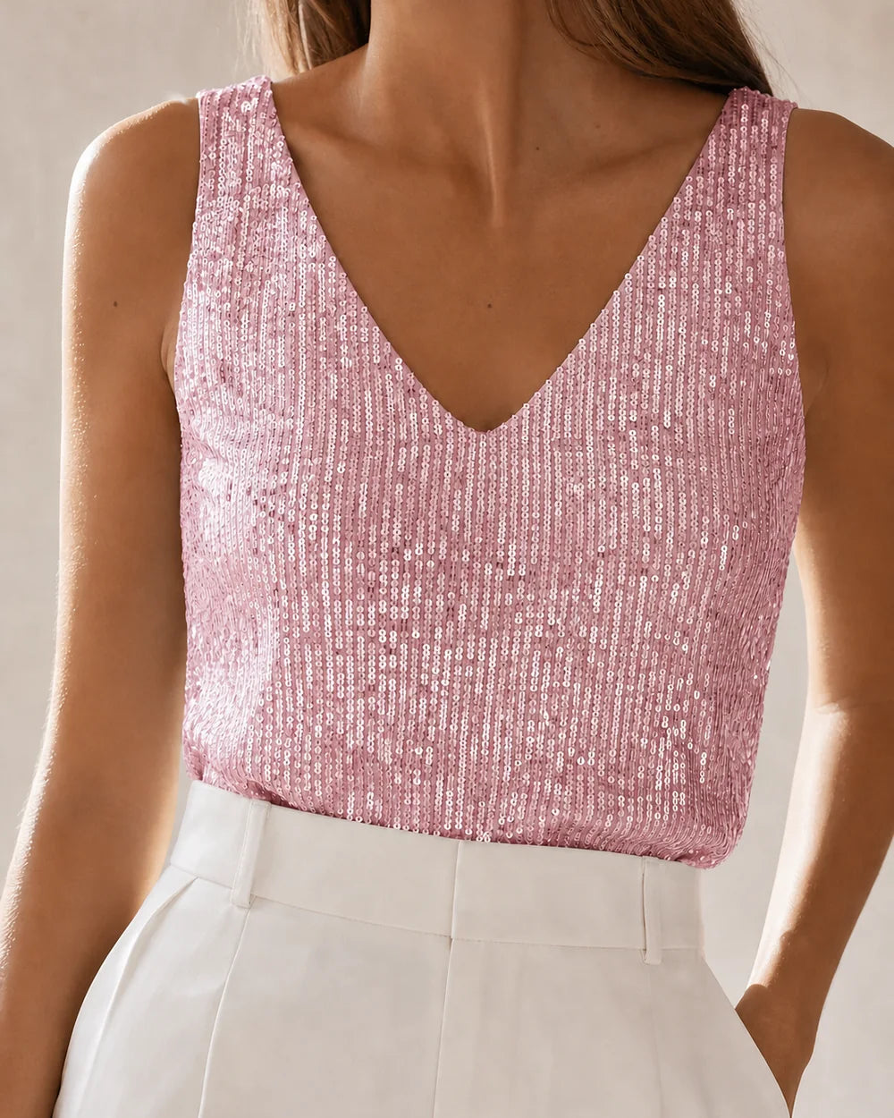 Women's pink sequin V-neck tank top in a front three-quarter view — momount-martha-sequin-top-pink-09-variant.webp