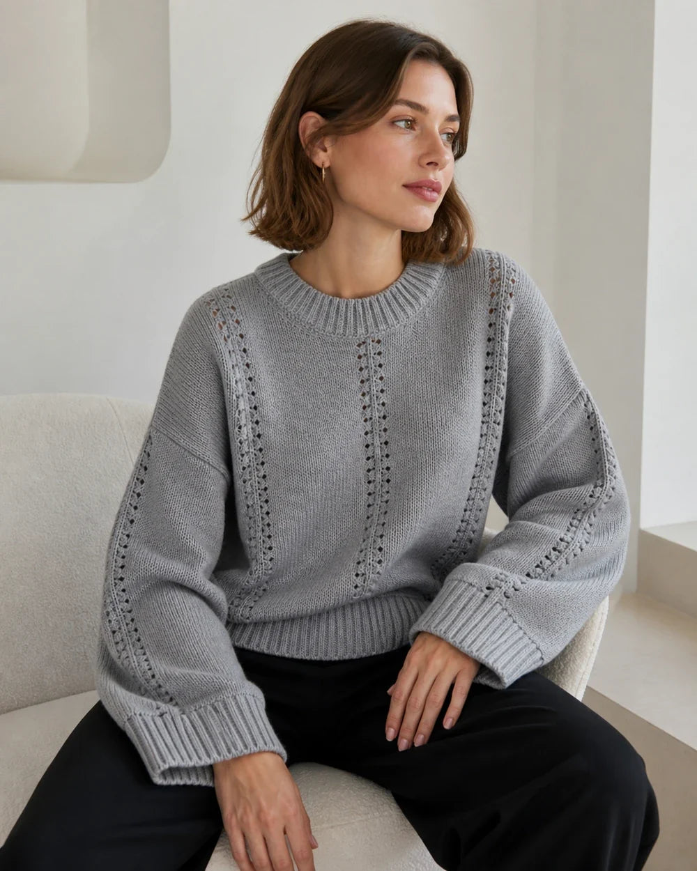 Grey oversized open-knit sweater for women, lifestyle view