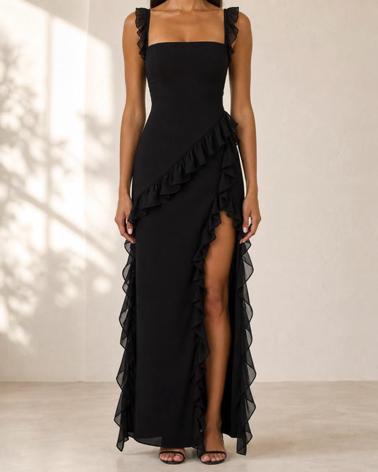 Women's black ruffled maxi dress, front product-first view. — womens-ruffled-maxi-dress-front-slit-black-01-hero.webp
